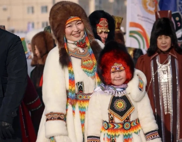 Yakutia - Reindeer Herding - Woman and girl in costume